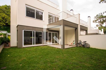 Vista de casa de condomínio à venda com 3 quartos, 277m² em Pedra Redonda, Porto Alegre