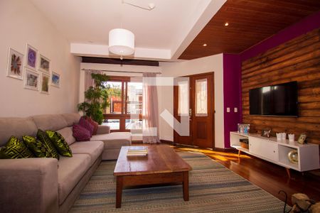 Sala de casa para alugar com 3 quartos, 182m² em Guarujá, Porto Alegre