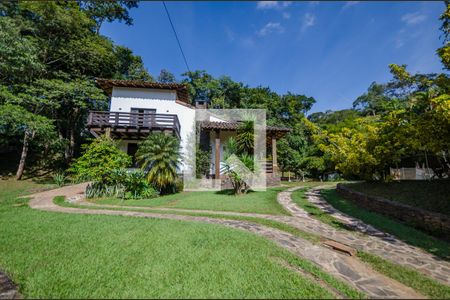 Casa de condomínio à venda com 400m², 5 quartos e 2 vagasFachada
