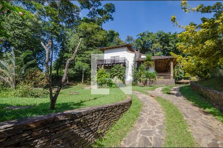 Casa de condomínio à venda com 400m², 5 quartos e 2 vagasFachada