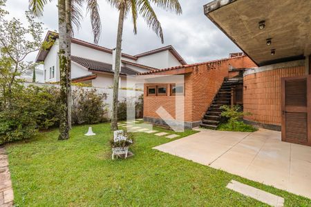 Casa de condomínio à venda com 478m², 4 quartos e 3 vagas Casa de condomínio à venda com 478m², 4 quartos e 3 vagasÁrea Externa