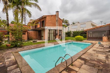 Casa de condomínio à venda com 478m², 4 quartos e 3 vagas Casa de condomínio à venda com 478m², 4 quartos e 3 vagasÁrea Externa