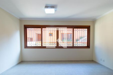 Sala de casa de condomínio para alugar com 4 quartos, 255m² em Vila Assunção, Porto Alegre