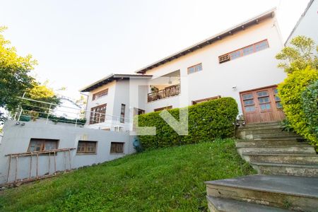 Casa de condomínio para alugar com 340m², 5 quartos e 2 vagasFachada