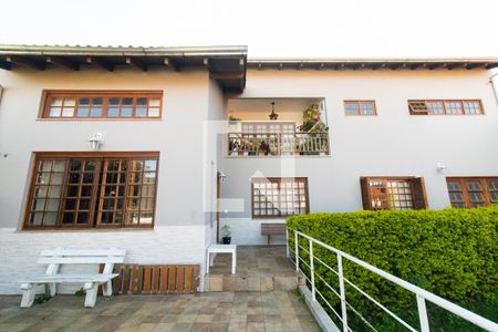 Casa de condomínio para alugar com 340m², 5 quartos e 2 vagasFachada