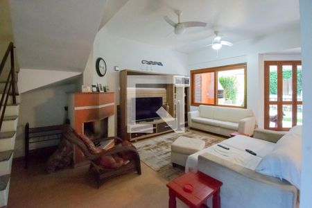 Sala de Estar de casa de condomínio à venda com 5 quartos, 284m² em Cavalhada, Porto Alegre