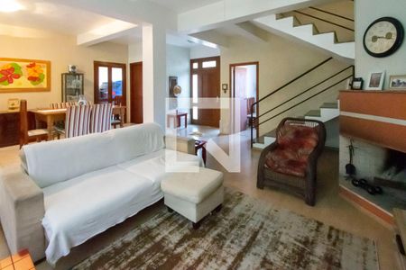 Sala de Estar de casa de condomínio à venda com 5 quartos, 284m² em Cavalhada, Porto Alegre