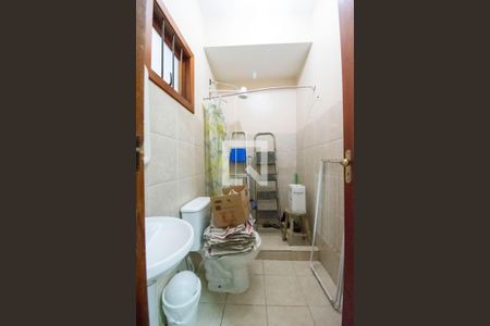 Casa de condomínio à venda com 284m², 5 quartos e 4 vagasBanheiro de Serviço