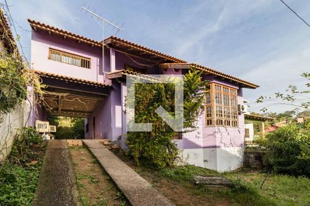 Casa de condomínio à venda com 199m², 4 quartos e 2 vagas Casa de condomínio à venda com 199m², 4 quartos e 2 vagasFachada
