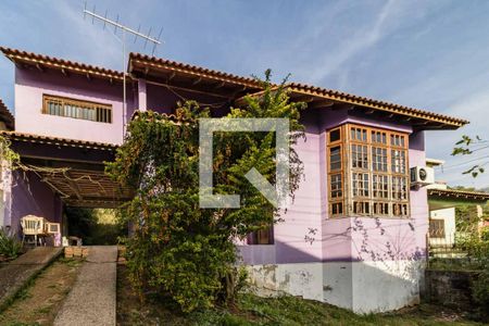 Casa de condomínio à venda com 199m², 4 quartos e 2 vagas Casa de condomínio à venda com 199m², 4 quartos e 2 vagasFachada