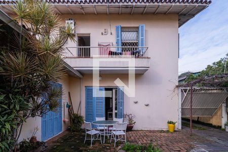 Fachada de casa à venda com 3 quartos, 281m² em Jardim Lindóia, Porto Alegre