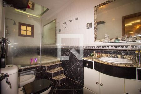 Casa à venda com 250m², 3 quartos e 2 vagas Casa à venda com 250m², 3 quartos e 2 vagasBanheiro da Suíte