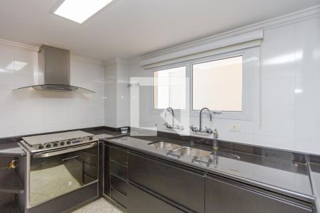 Casa de condomínio para alugar com 370m², 4 quartos e 4 vagasCozinha