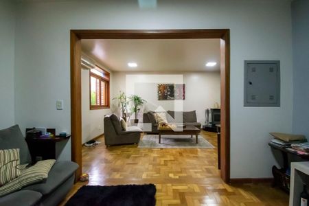 Sala de TV de casa de condomínio à venda com 3 quartos, 150m² em Vila Nova, Porto Alegre