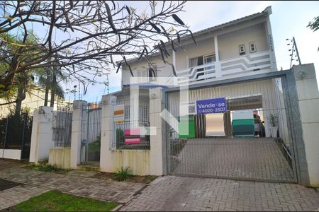 Fachada de casa à venda com 4 quartos, 292m² em Estância Velha, Canoas