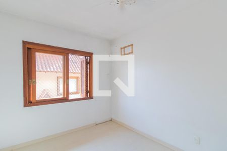 Quarto 2 de casa de condomínio à venda com 3 quartos, 250m² em Espírito Santo, Porto Alegre