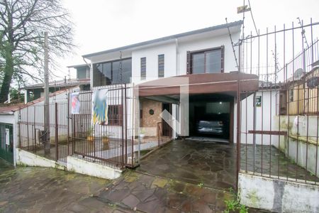 Casa à venda com 165m², 3 quartos e 3 vagas Casa à venda com 165m², 3 quartos e 3 vagasFachada