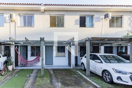 Casa de condomínio à venda com 62m², 2 quartos e 1 vagaFachada da Casa