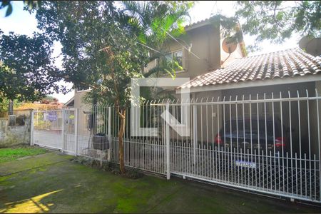 Fachada de casa à venda com 4 quartos, 153m² em Harmonia, Canoas