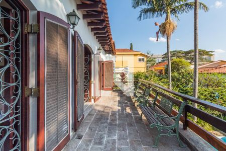 Casa à venda com 311m², 4 quartos e 4 vagas Casa à venda com 311m², 4 quartos e 4 vagasQuarto 1 - Varanda