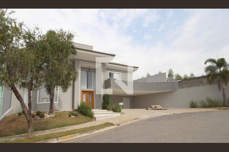 Casa de condomínio para alugar com 450m², 4 quartos e 5 vagasFachada