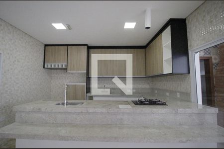 Casa de condomínio para alugar com 450m², 4 quartos e 5 vagasCozinha