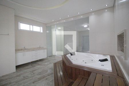 Casa de condomínio para alugar com 450m², 4 quartos e 5 vagasBanheiro da Suíte master