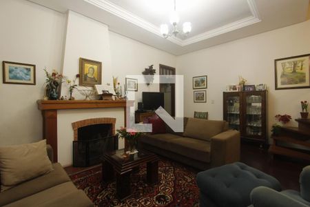 Sala de casa à venda com 3 quartos, 150m² em Independência, Porto Alegre