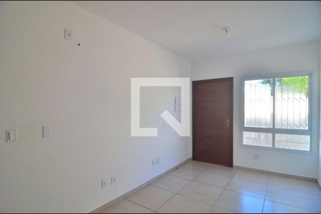 Sala de casa de condomínio à venda com 2 quartos, 52m² em Niterói, Canoas
