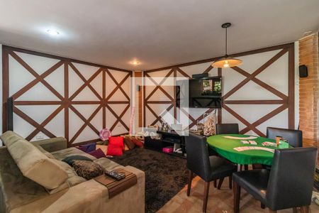 Casa de condomínio à venda com 500m², 4 quartos e 3 vagasSala de TV 1