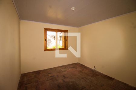 Quarto 1 de casa para alugar com 3 quartos, 60m² em Vila Nova, Porto Alegre