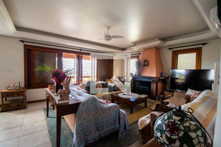 Sala de casa de condomínio à venda com 3 quartos, 389m² em Vila Nova, Porto Alegre