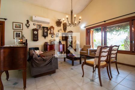 Sala de casa de condomínio à venda com 3 quartos, 389m² em Vila Nova, Porto Alegre