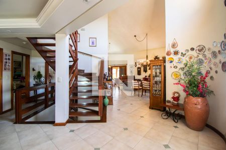 Sala de casa de condomínio à venda com 3 quartos, 389m² em Vila Nova, Porto Alegre