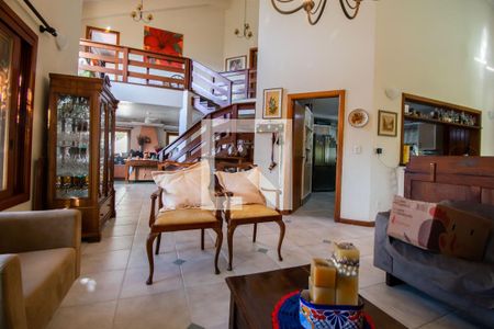 Sala de casa de condomínio à venda com 3 quartos, 389m² em Vila Nova, Porto Alegre