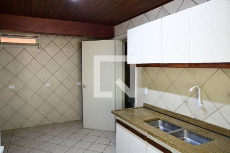 Casa de condomínio para alugar com 280m², 4 quartos e 4 vagasCozinha