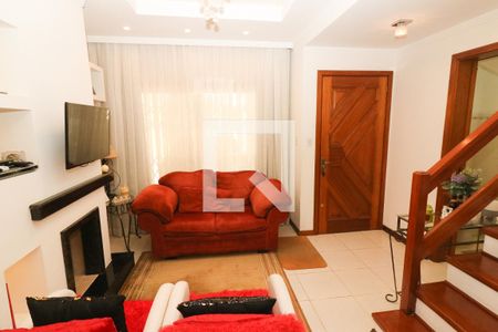 Sala de Estar de casa de condomínio à venda com 3 quartos, 187m² em Cavalhada, Porto Alegre