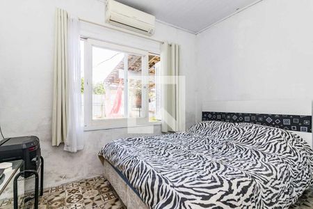 Dormitório de casa à venda com 1 quarto, 80m² em Campo Novo, Porto Alegre