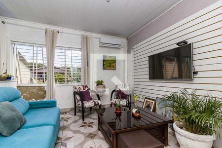 Sala de casa à venda com 1 quarto, 80m² em Campo Novo, Porto Alegre
