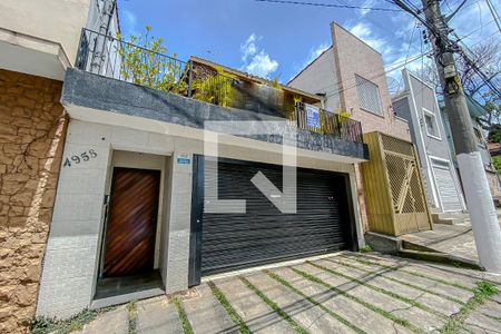 Casa à venda com 240m², 4 quartos e 2 vagas Casa à venda com 240m², 4 quartos e 2 vagasFachada