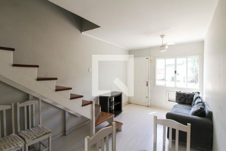 Sala de casa de condomínio à venda com 2 quartos, 88m² em Rio Branco, Canoas