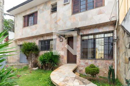 Casa à venda com 149m², 3 quartos e 2 vagas Casa à venda com 149m², 3 quartos e 2 vagasFachada