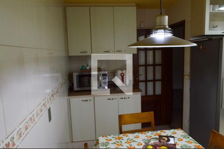 Casa de condomínio à venda com 400m², 4 quartos e 3 vagas Casa de condomínio à venda com 400m², 4 quartos e 3 vagasCozinha