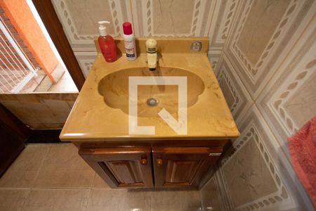 Casa à venda com 200m², 4 quartos e 5 vagasBanheiro da churrasqueira