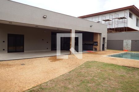 Casa de condomínio para alugar com 360m², 5 quartos e 6 vagasQuintal