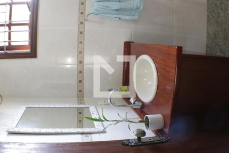 Casa de condomínio à venda com 420m², 5 quartos e 4 vagasLavabo