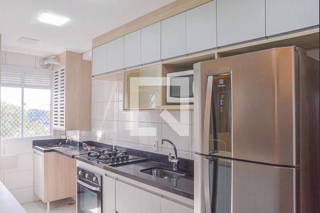 Apartamento à venda com 40m², 2 quartos e 1 vaga Apartamento à venda com 40m², 2 quartos e 1 vagaCozinha e Área de Serviço