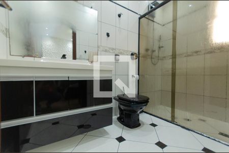 Casa à venda com 477m², 4 quartos e 4 vagasBanheiro Suíte 2