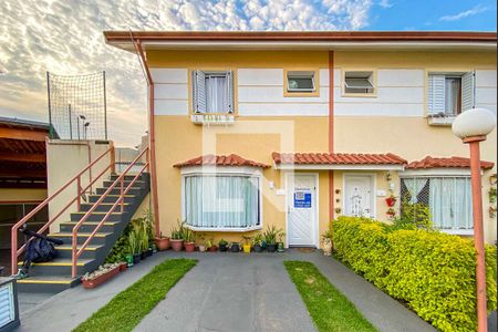 Casa de condomínio à venda com 119m², 2 quartos e 2 vagasFachada e Garagem