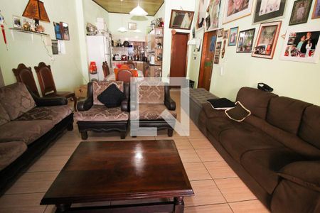 Sala de Estar de casa à venda com 2 quartos, 200m² em Vila Nova, Porto Alegre